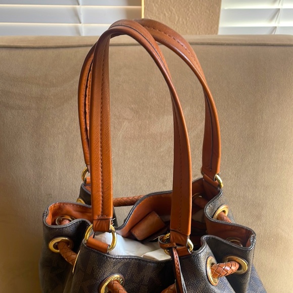 Gently used Mikael Kors monogram purse - Picture 4 of 6